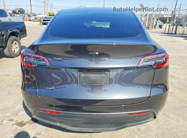 7SAYGDED2SF259629 2025 TESLA MODEL Gray წინა სალონის ხედი