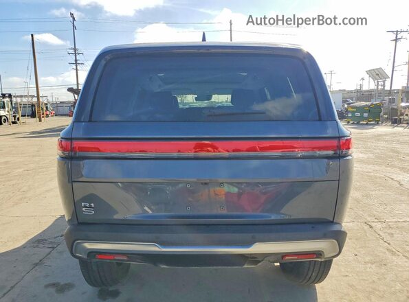7PDSGCBA3RN030064 2024 RIVIAN R1S Gray Вид салону спереду
