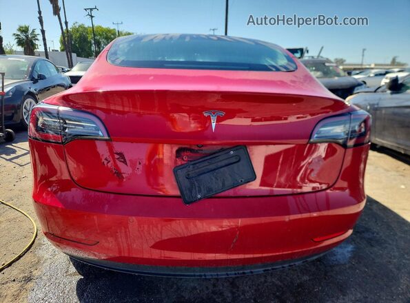 5YJ3E1EA7NF288906 2022 TESLA MODEL 3 Красный Вид салона спереди