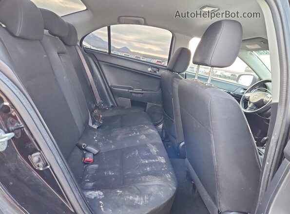 JA32U2FU5GU007868 2016 MITSUBISHI LANCER Black Widok wnętrza z tyłu