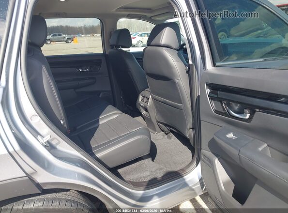 7FARS4H77PE015640 2023 HONDA CR-V Silver VIN sticker view