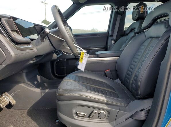 7FCTGAAA1PN018200 2023 RIVIAN R1T Blue წინა სალონის ხედი