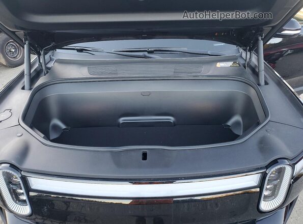 7PDSGABA2RN035910 2024 RIVIAN R1S Black ძრავის განყოფილების ხედი