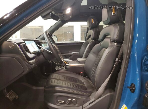 7PDSGABA8PN009731 2023 RIVIAN R1S Blue Vista interior delantera