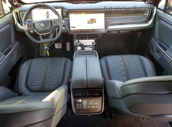 7PDSGCBA1RN029852 2024 RIVIAN R1S Maroon Vista del salpicadero