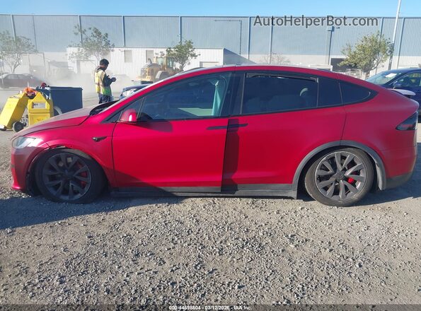 7SAXCBE64RF440576 2024 TESLA MODEL X Burgundy Vista interior trasera