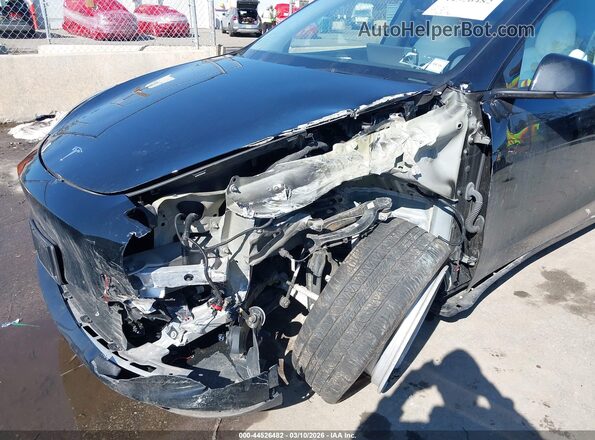 7SAYGAEE5RF983185 2024 TESLA MODEL Y Black Front view