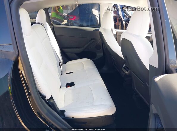 7SAYGAEE5RF983185 2024 TESLA MODEL Y Black VIN sticker view