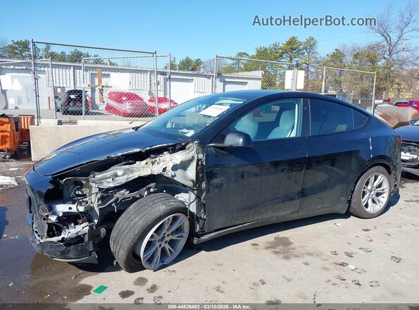 7SAYGAEE5RF983185 2024 TESLA MODEL Y Black Rear interior view