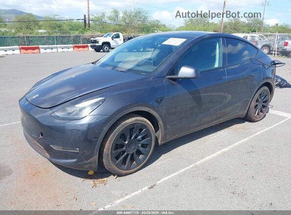 7SAYGAEE9RF118803 2024 TESLA MODEL Y Black Առջևի ձախ երեք քառորդ տեսարան