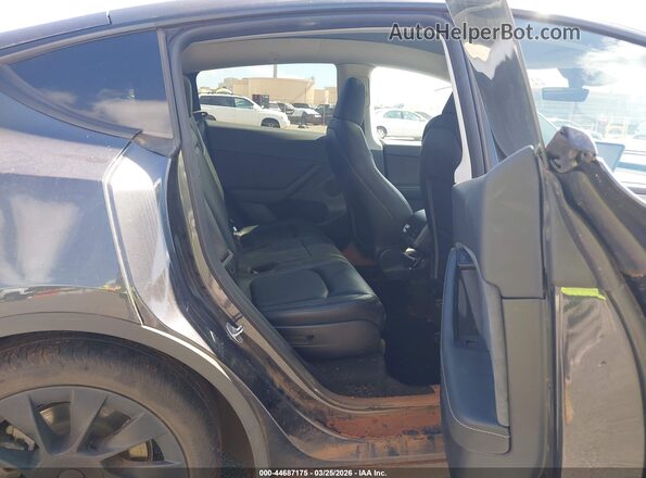 7SAYGAEE9RF118803 2024 TESLA MODEL Y Black VIN կոդի պիտակի տեսք