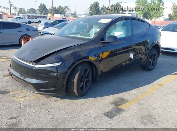 7SAYGDED1TF585102 2026 TESLA MODEL Y Black Առջևի ձախ երեք քառորդ տեսարան