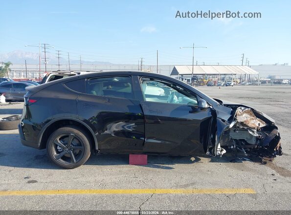 7SAYGDED1TF585102 2026 TESLA MODEL Y Black Սալոնի հետևի տեսք