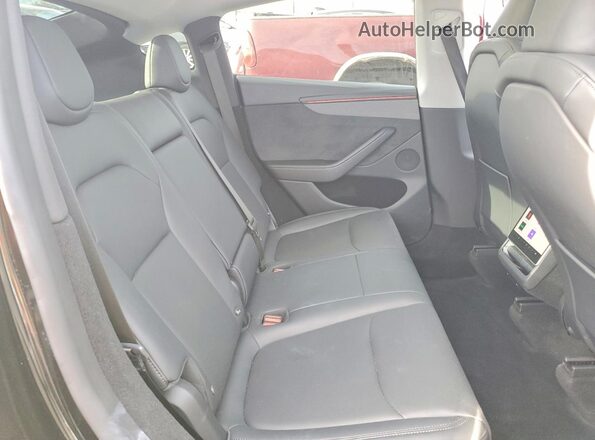 7SAYGDED5TF384495 2026 TESLA MODEL Black Սալոնի հետևի տեսք