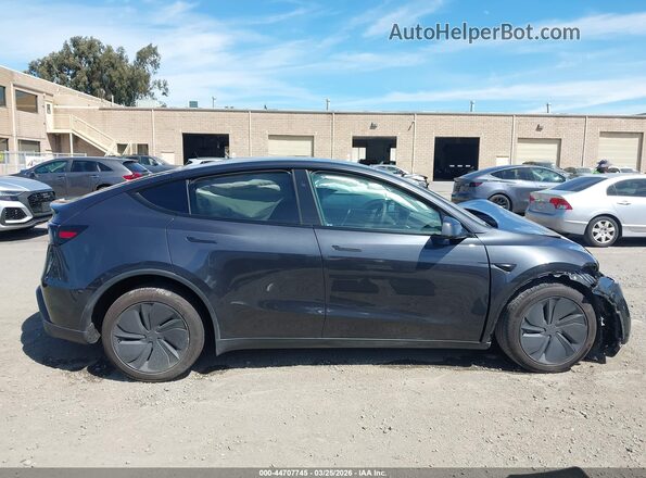 7SAYGDED5TF387848 2026 TESLA MODEL Y Gray Widok zestawu wskaźników