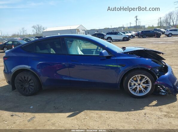 7SAYGDEE0RA286179 2024 TESLA MODEL Y Blue Rear interior view