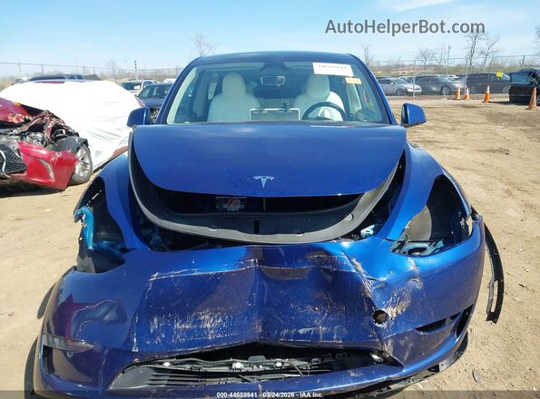 7SAYGDEE0RA286179 2024 TESLA MODEL Y Blue Instrument cluster view