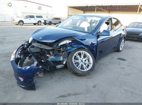 7SAYGDEE0RF068391 2024 TESLA MODEL Y Blue წინა მარცხენა ხედი სამი მეოთხედიდან