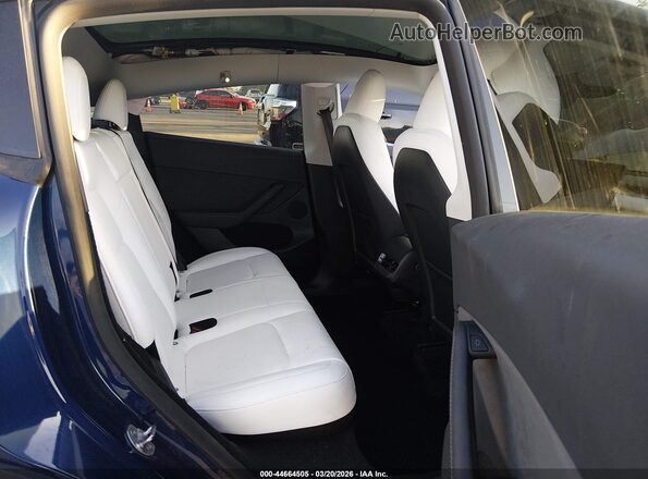 7SAYGDEE0RF068391 2024 TESLA MODEL Y Blue VIN კოდის სტიკერის ხედი