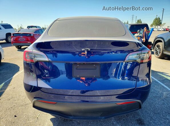 7SAYGDEE3NF345884 2022 TESLA MODEL Blue Rear view