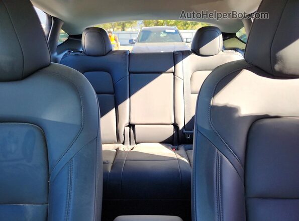 7SAYGDEE3NF345884 2022 TESLA MODEL Blue Rear seats view
