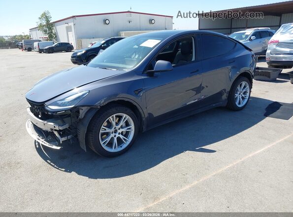 7SAYGDEE5NF389370 2022 TESLA MODEL Y Gray Առջևի ձախ երեք քառորդ տեսարան