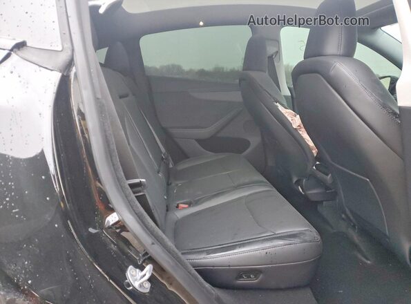 7SAYGDEE7TA473524 2026 TESLA MODEL Black Vista interior trasera