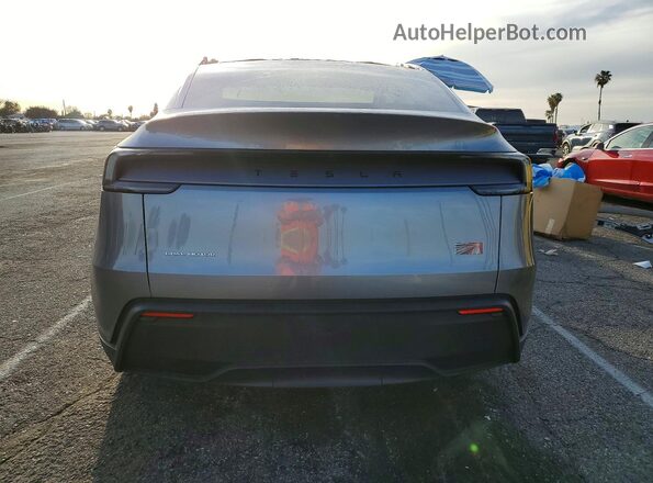 7SAYGDEE8TF329581 2026 TESLA MODEL Silver Rear view