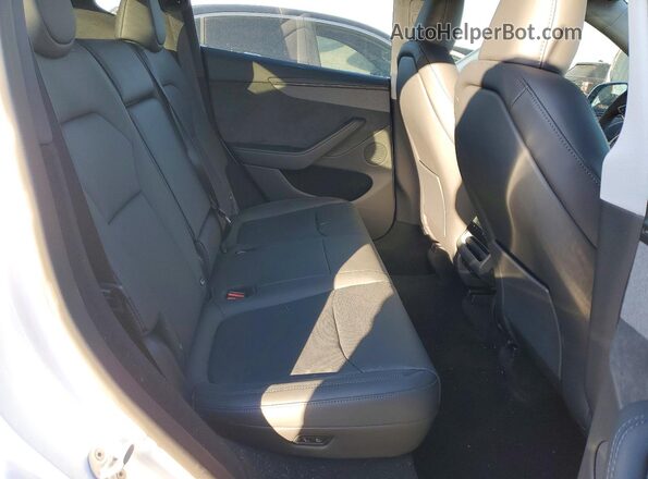 7SAYGDEE9TF376618 2026 TESLA MODEL White Вид задніх сидінь