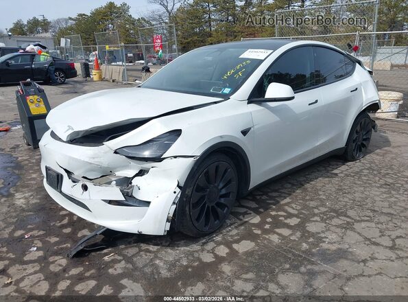 7SAYGDEF0NF567680 2022 TESLA MODEL Y White Vista tres cuartos delantera izquierda
