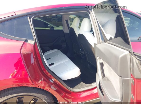 7SAYGDEF9RF101218 2024 TESLA MODEL Y Red VIN sticker view
