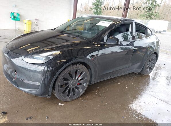 7SAYGDEFXNF398655 2022 TESLA MODEL Y Black Առջևի ձախ երեք քառորդ տեսարան