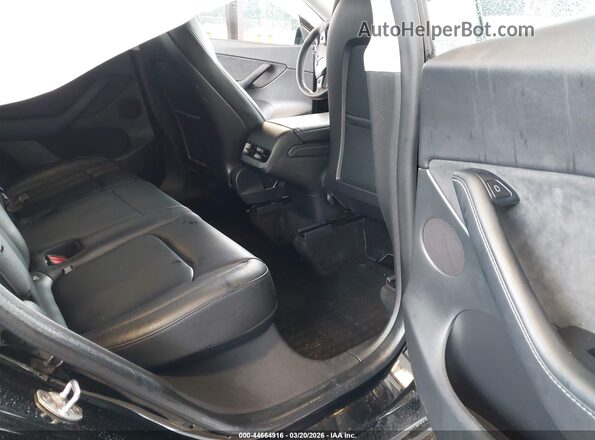 7SAYGDEFXNF398655 2022 TESLA MODEL Y Black VIN կոդի պիտակի տեսք