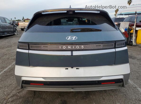 7YAKR4DA8TY041368 2026 HYUNDAI IONIQ Серый Вид сзади
