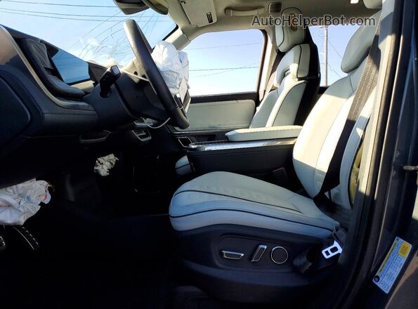 7FCTGAAA4PN001004 2023 RIVIAN R1T Gray Vista del salpicadero