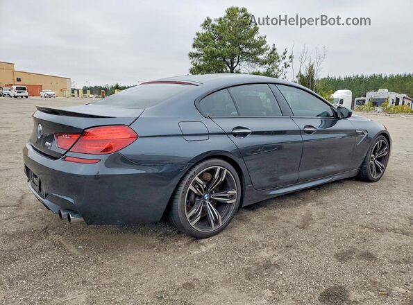 WBS6E9C54JG437590 2018 BMW M6 Gray Delantero derecho