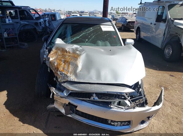JA32U2FUXGU011530 2016 MITSUBISHI LANCER Silver Widok z przodu
