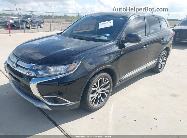 JA4AD2A3XGZ016719 2016 MITSUBISHI OUTLANDER Black Vista tres cuartos delantera izquierda