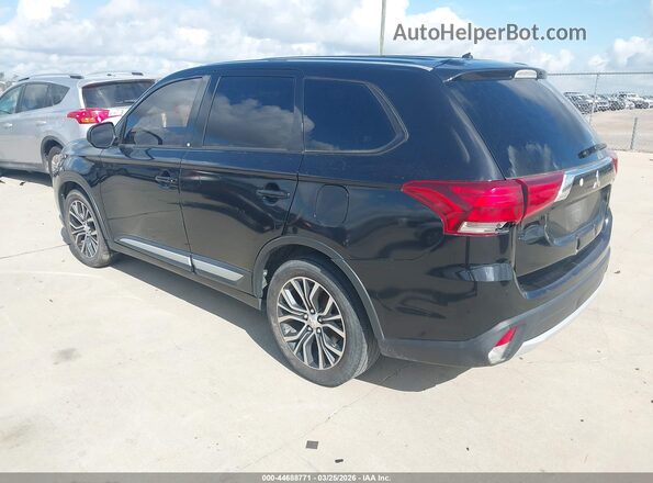 JA4AD2A3XGZ016719 2016 MITSUBISHI OUTLANDER Black Trasero izquierdo