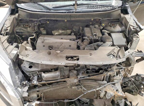 JA4APVAU7MU013934 2021 MITSUBISHI OUTLANDER Black ძრავის განყოფილების ხედი