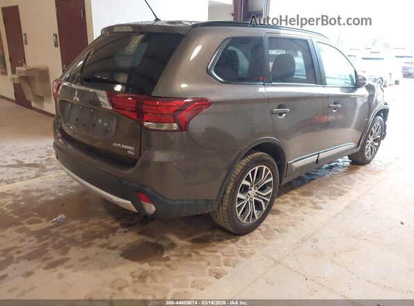 JA4AZ3A3XGZ024259 2016 MITSUBISHI OUTLANDER Gray Trasero derecho