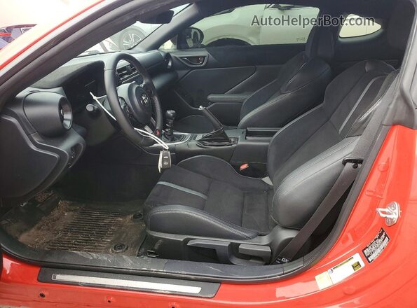 JF1ZNBE1XP9759272 2023 TOYOTA GR Red Widok wnętrza z przodu