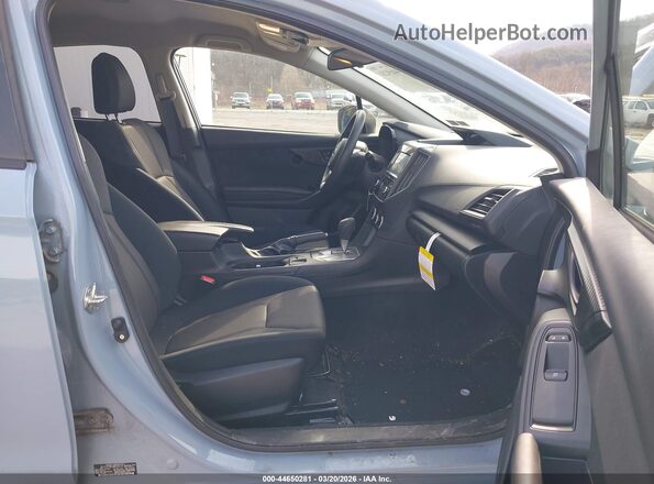 JF2GTABC6M8305174 2021 SUBARU CROSSTREK Light Blue Vista interior delantera