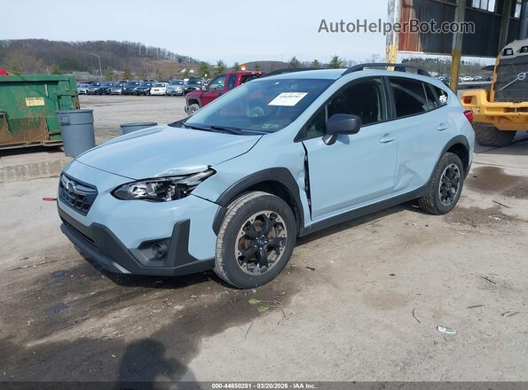 JF2GTABC6M8305174 2021 SUBARU CROSSTREK Light Blue Vista tres cuartos delantera izquierda
