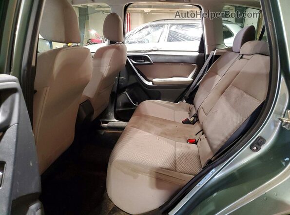 JF2SJAGC4HH472521 2017 SUBARU FORESTER 2.5 Green Rear interior view