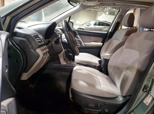 JF2SJAGC4HH472521 2017 SUBARU FORESTER 2.5 Green Front interior view