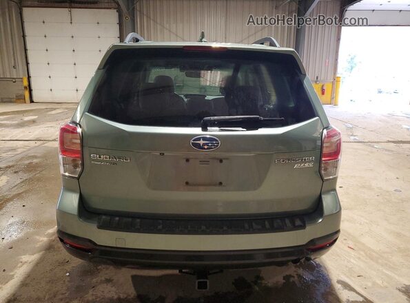 JF2SJAGC4HH472521 2017 SUBARU FORESTER 2.5 Green Rear view