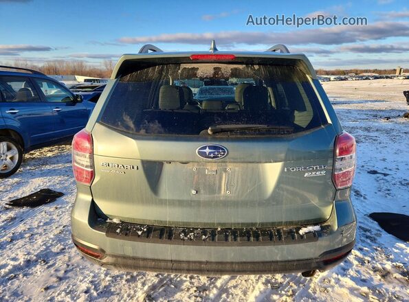 JF2SJAXC9GH407324 2016 SUBARU FORESTER 2.5I TO Зеленый Вид сзади