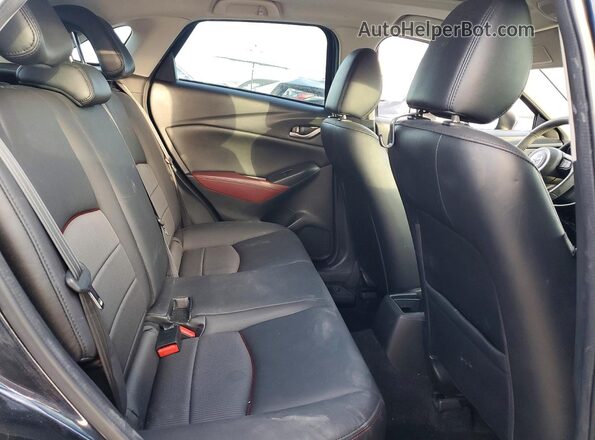 JM1DKDC76J0313843 2018 MAZDA CX-3 Blue Rear interior view