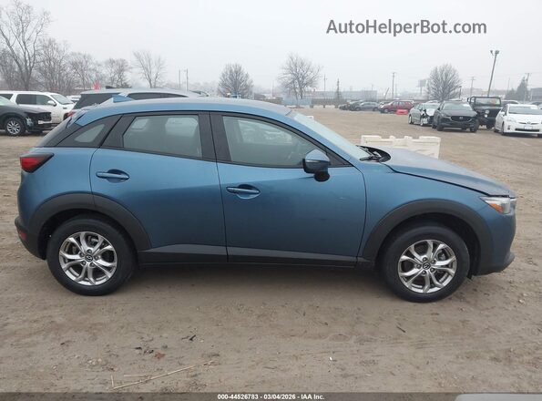 JM1DKFB76M1504805 2021 MAZDA CX-3 Blue Widok wnętrza z tyłu